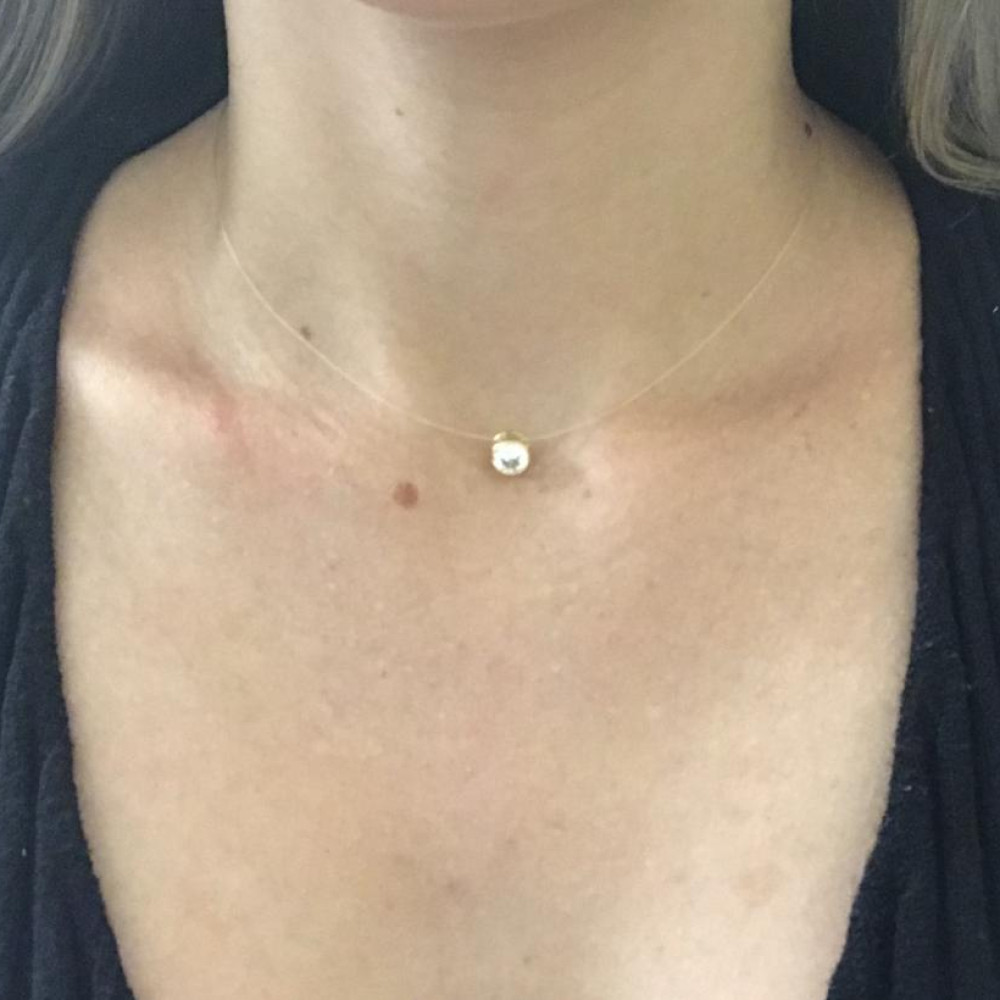 Colar ponto de luz com linha invisível folheado a ouro 18k