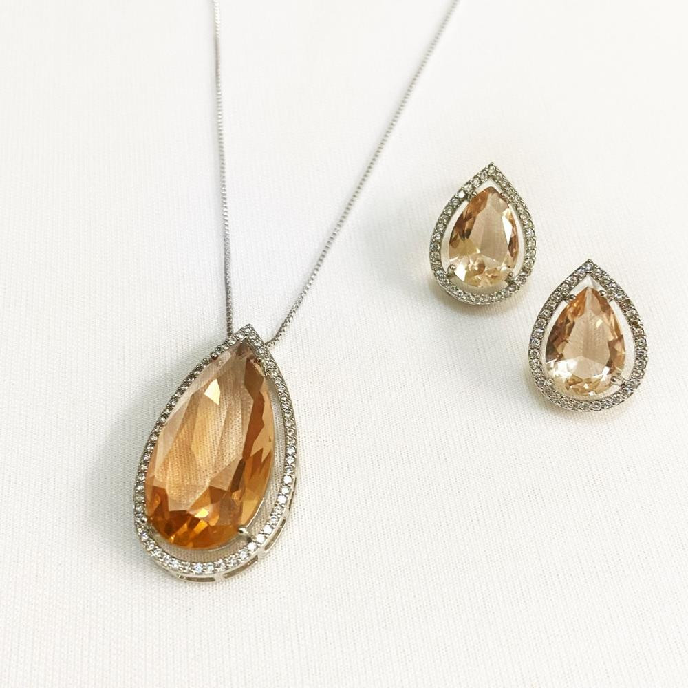 Conjunto de gota grande cravejada com zircônia folheada a ródio branco  