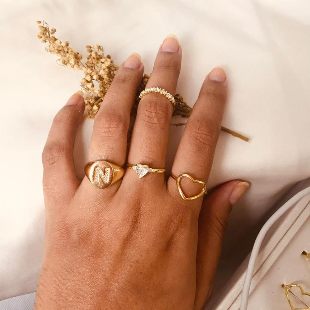 Anel aparador de aliança cravejado com zircônia banhado a ouro 18k
