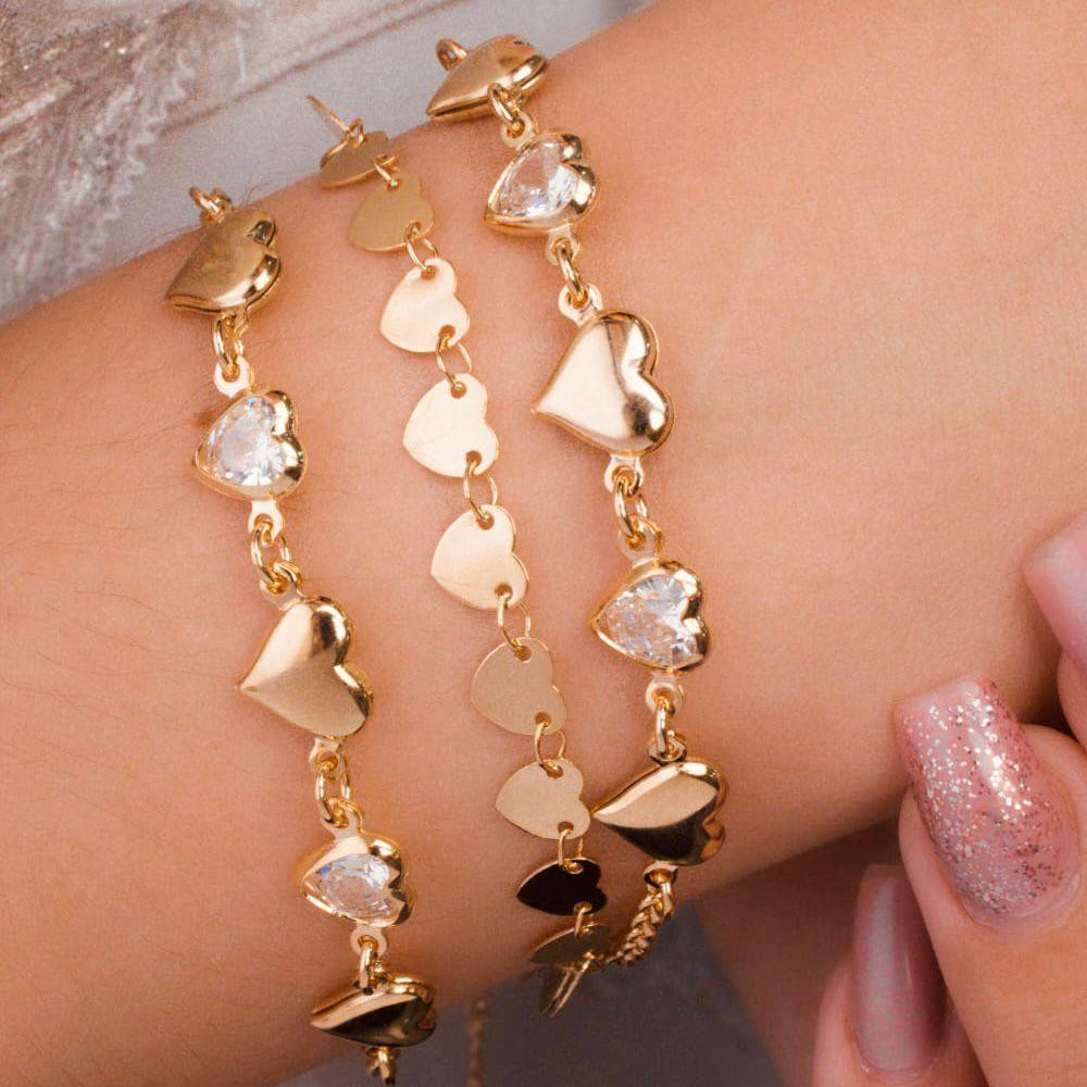 Pulseira de coração liso e cravejado banhado a ouro 18k