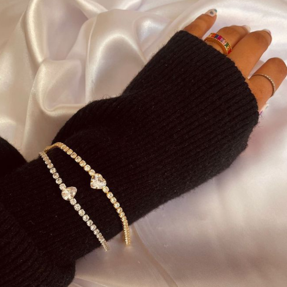 Pulseira riviera com pingente de coração cravejado banhada a ouro 18k