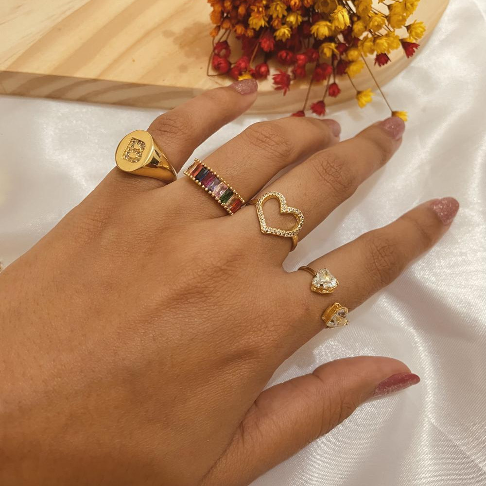 Anel cravejado com zircônia colorida banhado a ouro 18k