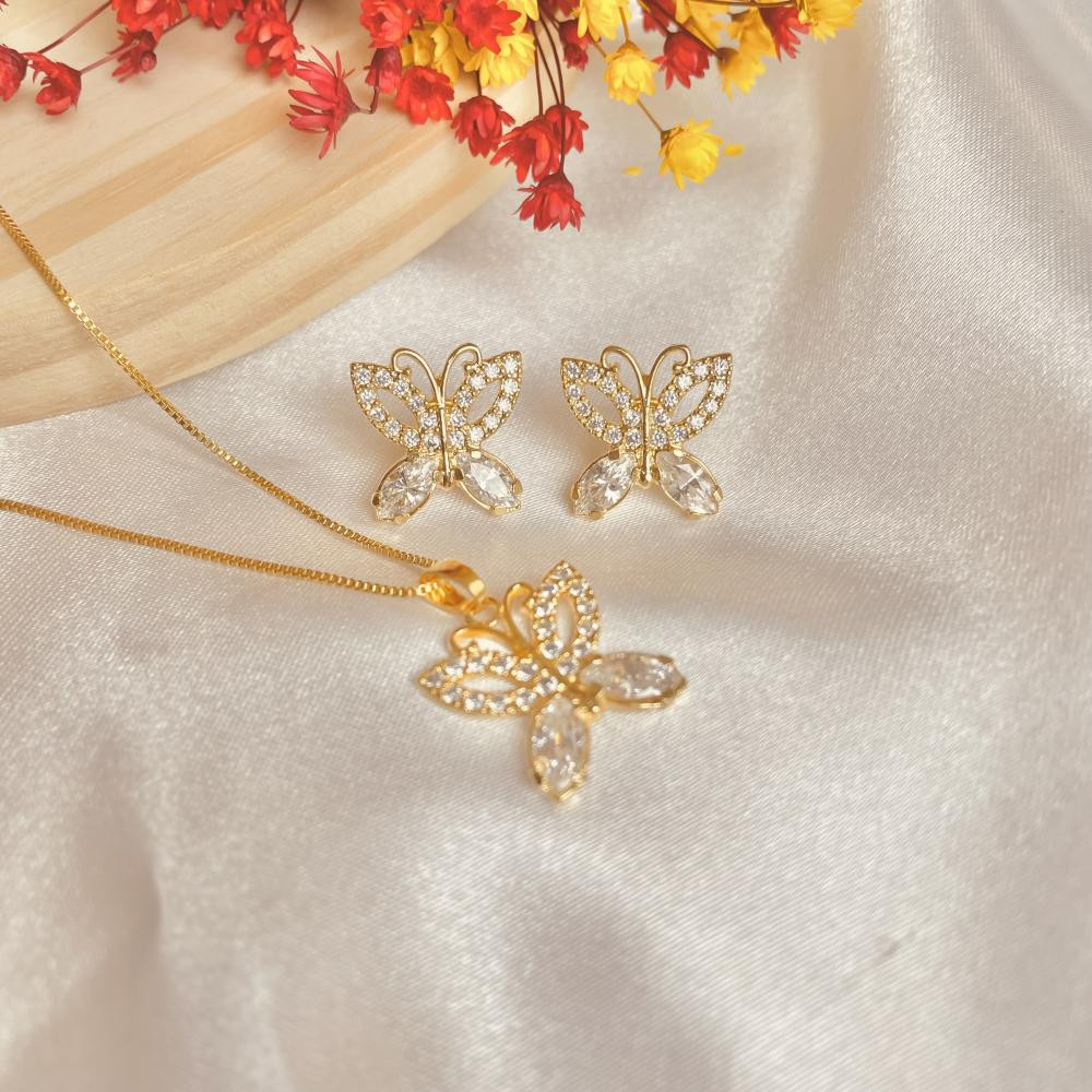 Conjunto de borboleta cravejado com zircônia e banhado a ouro 18k