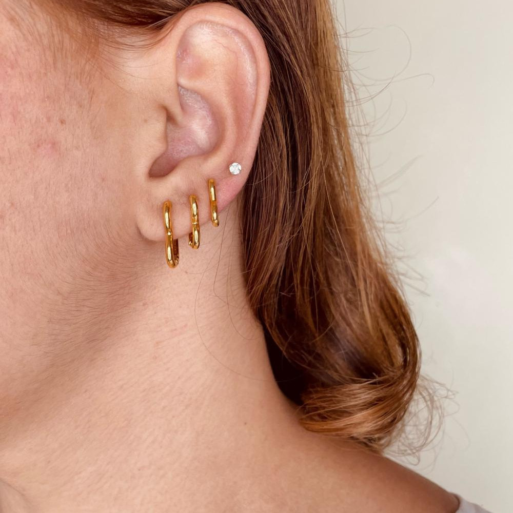 Trio de argolas de coração liso banhado a ouro 18k