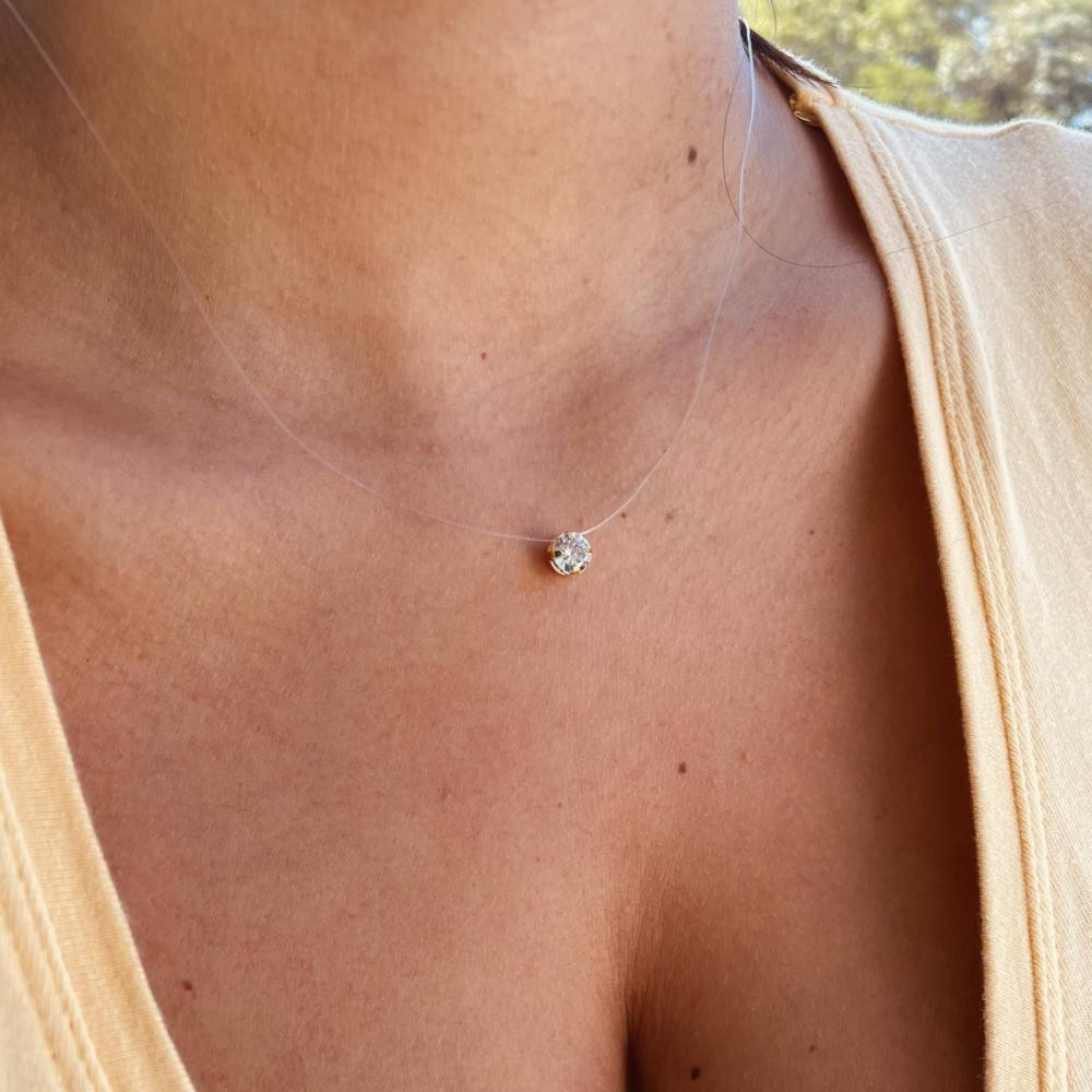 Colar ponto de luz com linha invisível folheado a ouro 18k