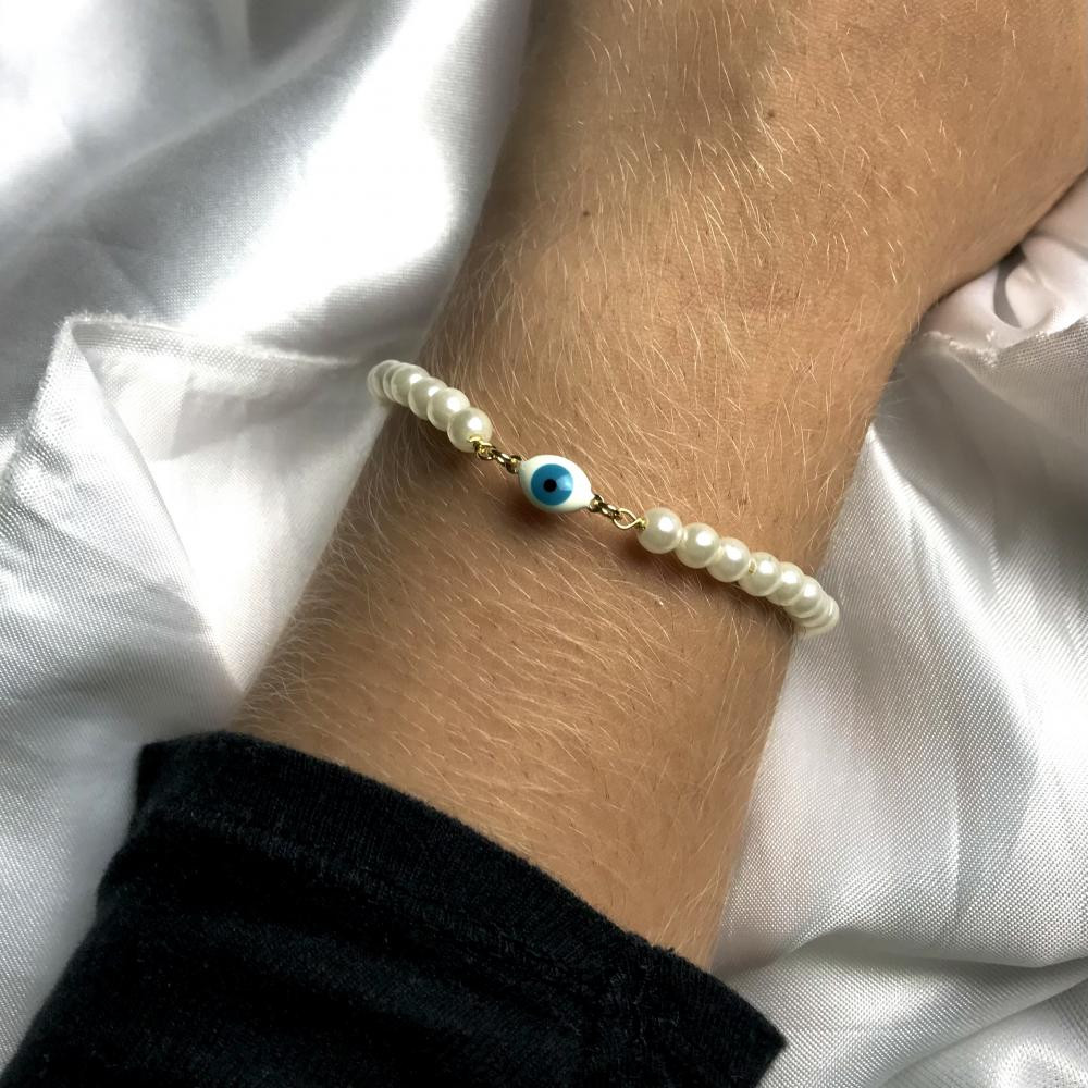 Pulseira de pérola com olho grego banhada a ouro 18k 