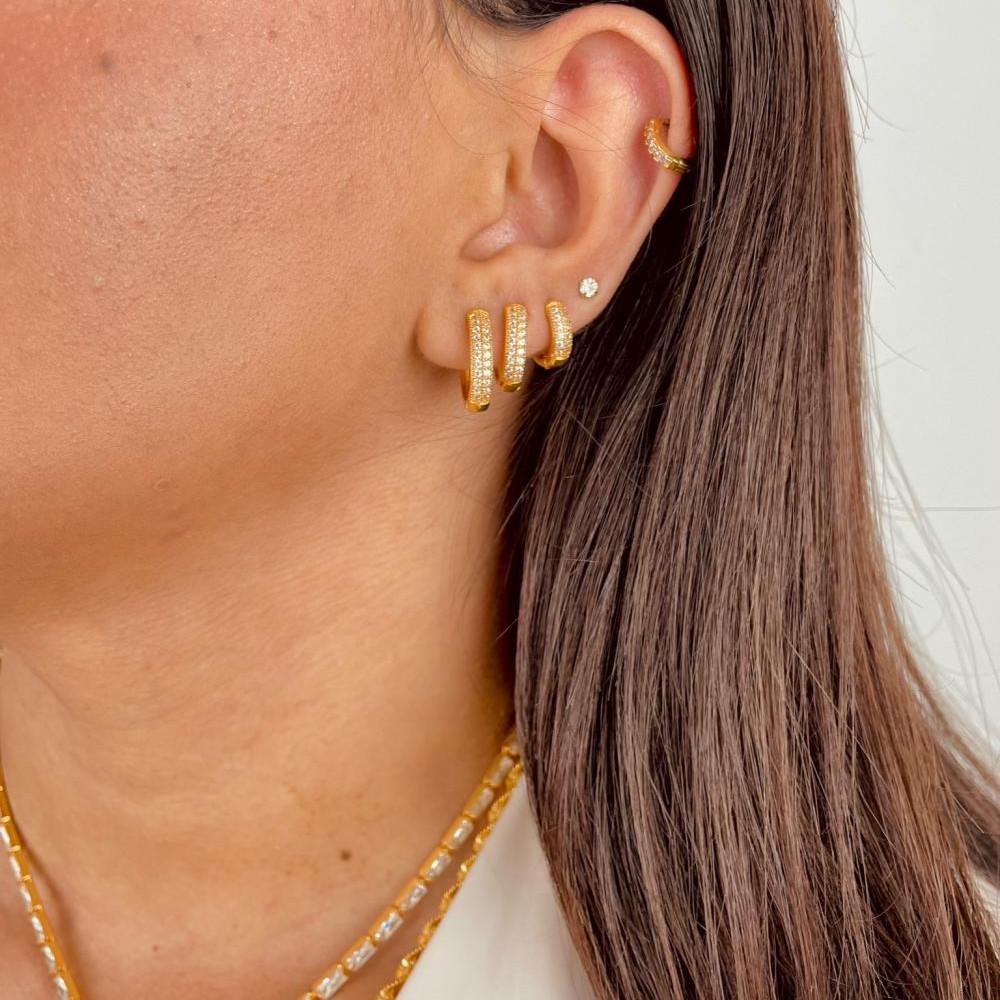 Trio de argolas cravejados com zircônia banhado a ouro 18k