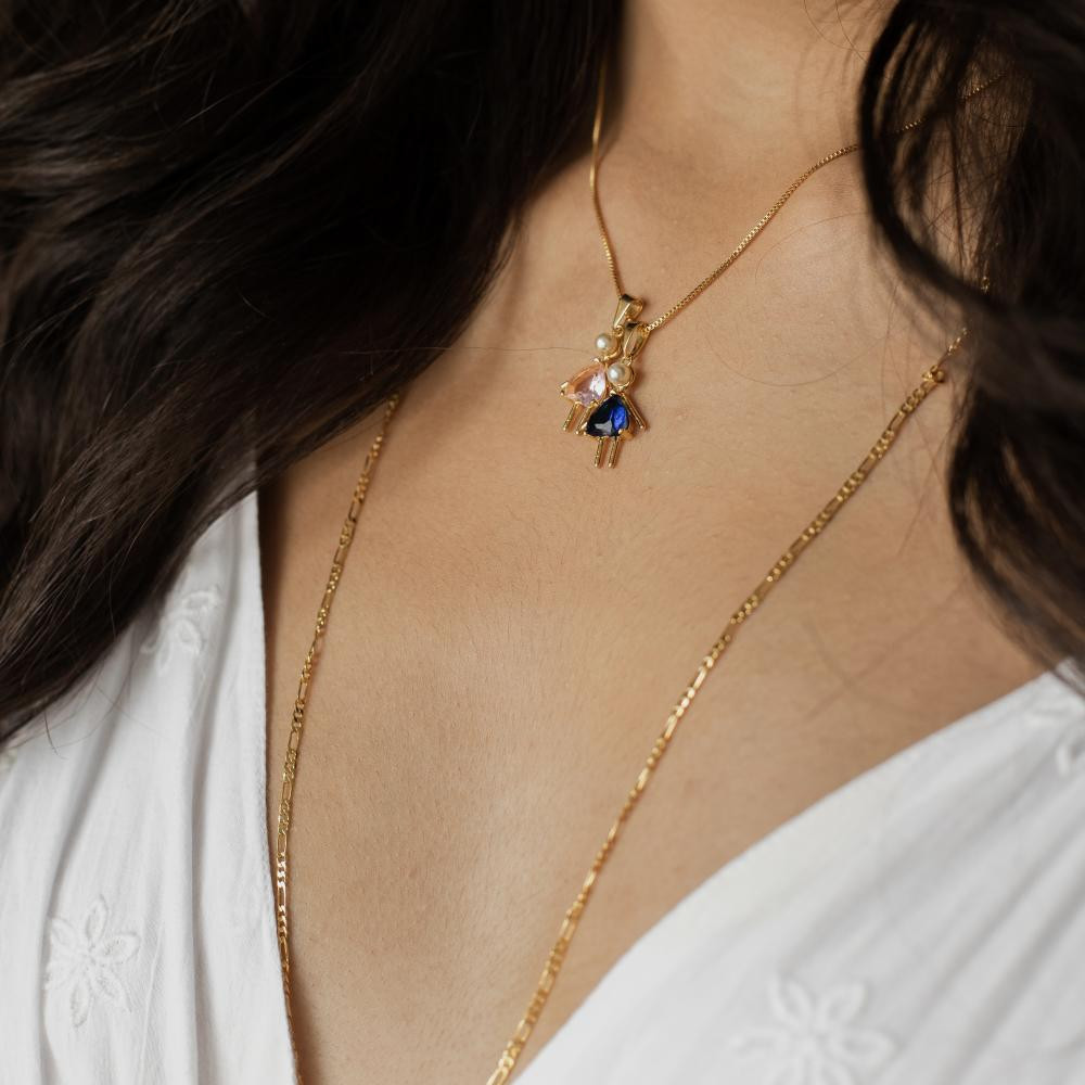 Colar filho com um pingente em coração e pérola banhado a ouro 18k 