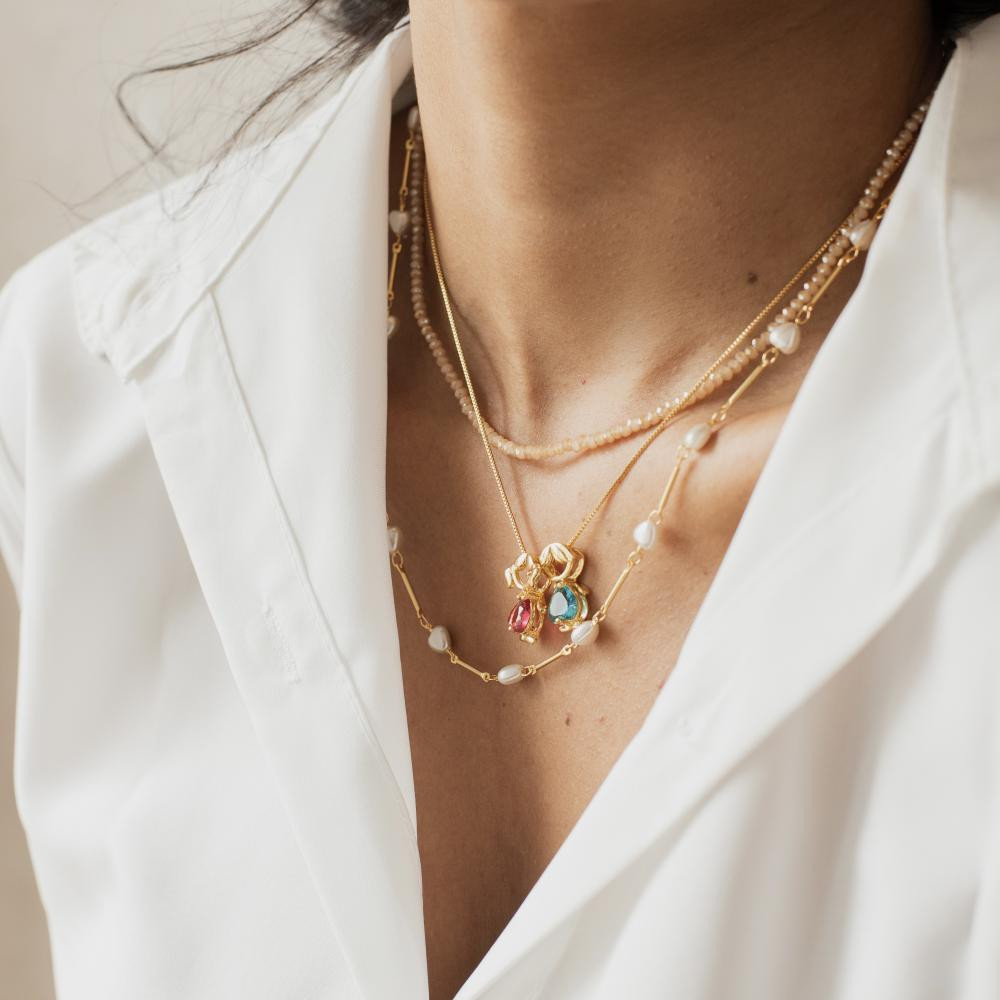 Colar Keli coração de pérola com palito banhado a ouro 18k 