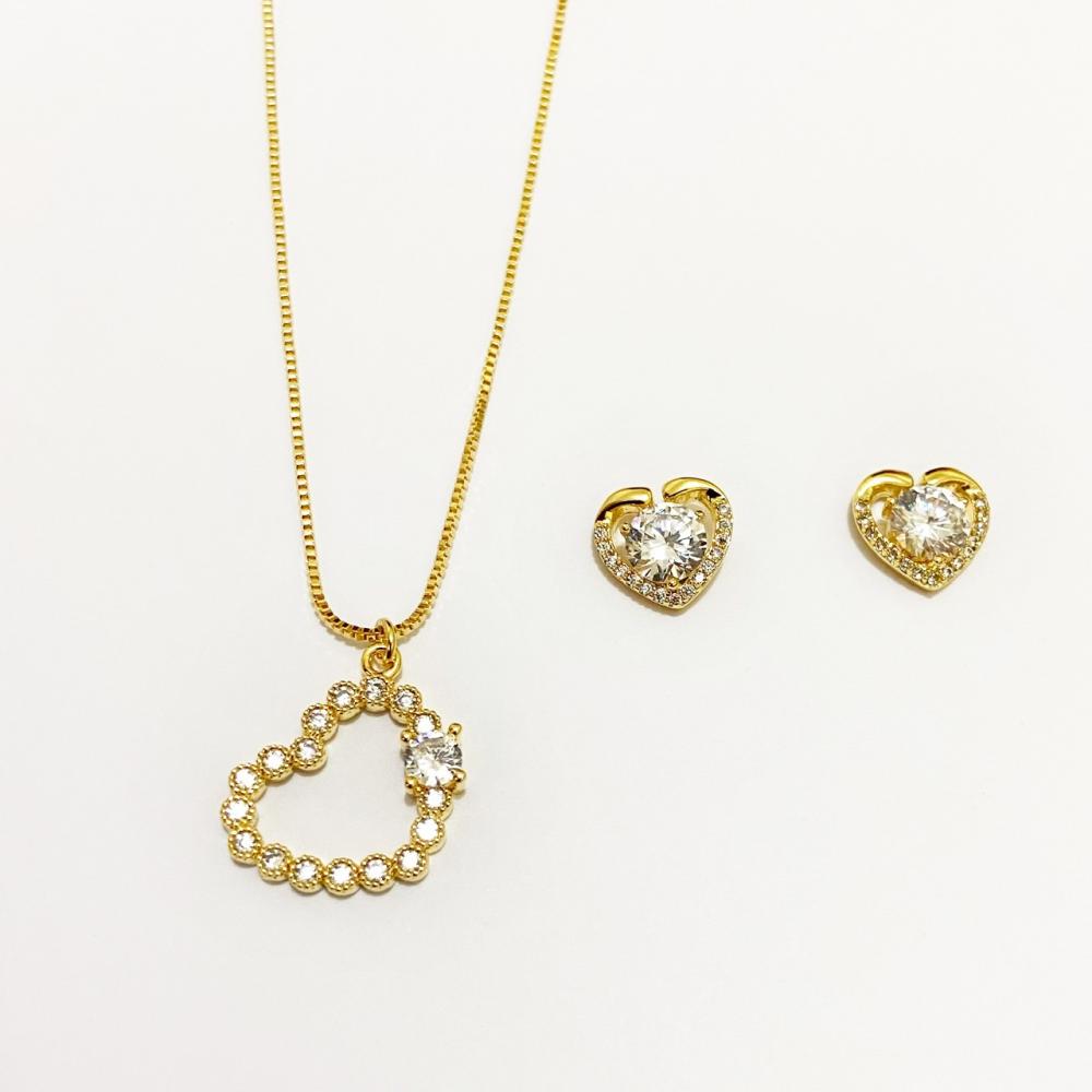 Conjunto de coração cravejado com zircônia cristal folheado a ouro 18k