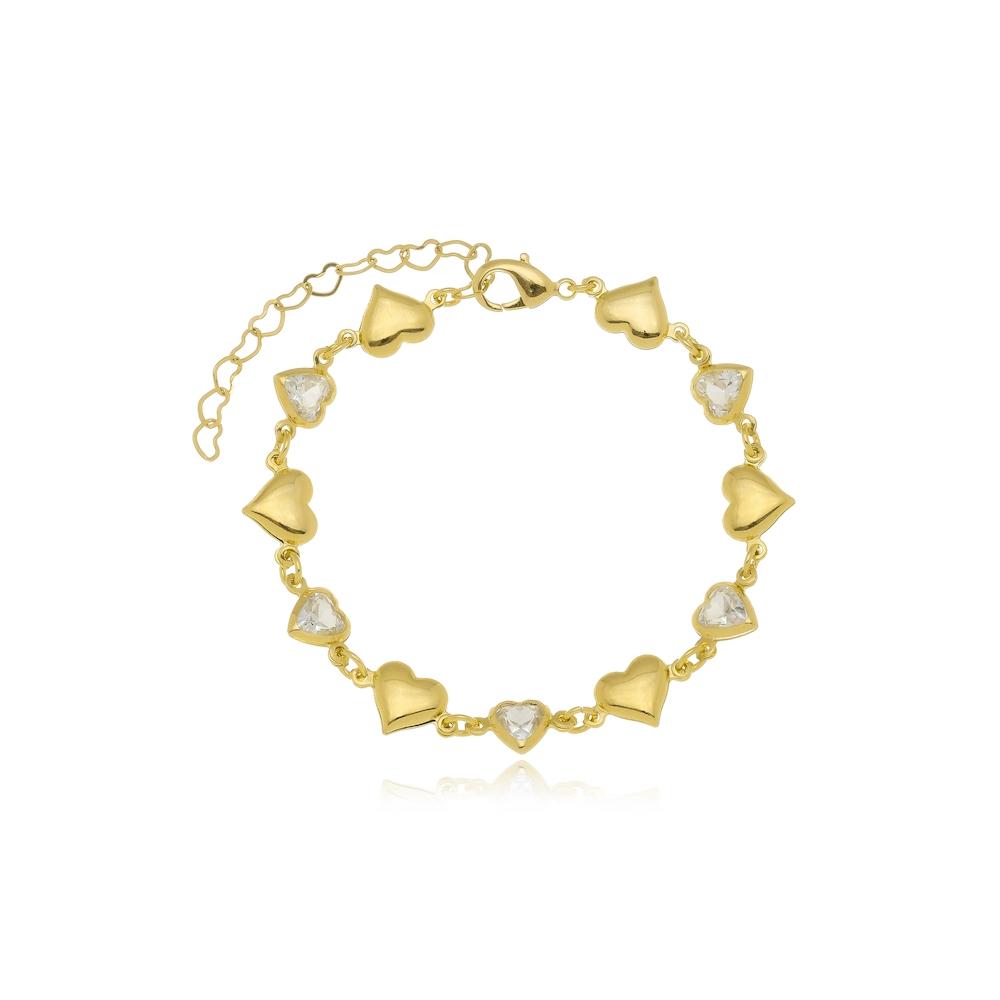 Pulseira de coração liso e cravejado banhado a ouro 18k